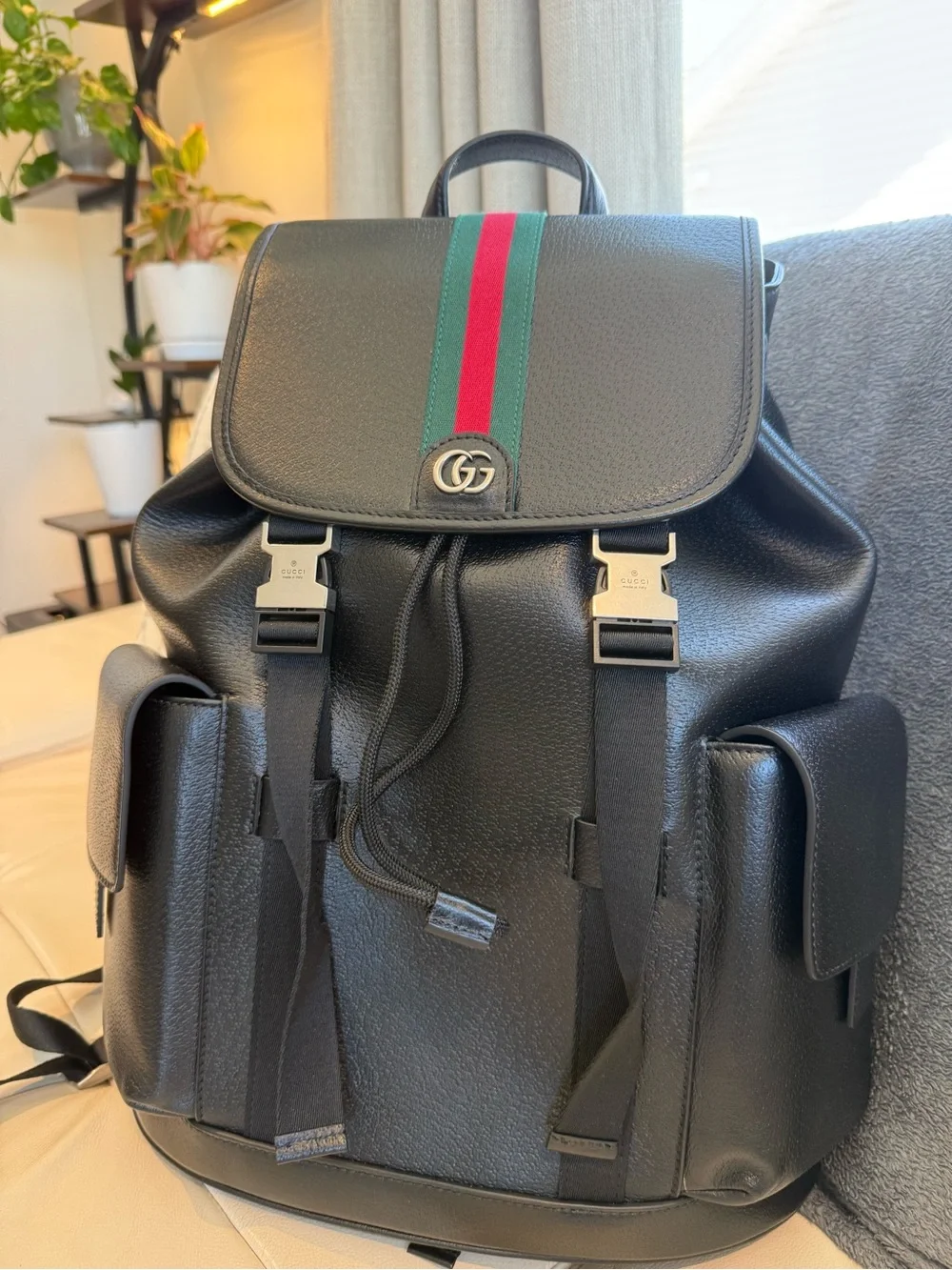 Used Black Leather Backpack with Signature Green-Red Stripe